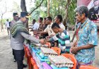 Kapolda-NTT-Salurkan-Bantuan-Sosial-kepada-Warga-Desa-Benu-Usai-Resmikan-Jembatan-Merah-Putih