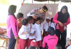  --Peduli-Pendidikan,-Bhayangkari-Salurkan-Bantuan-Perlengkapan-Sekolah-di-Sekolah-Darurat-Polres-Manggarai-Timur
